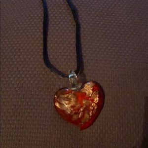 Artisan glass necklace. Red heart with gold flecks